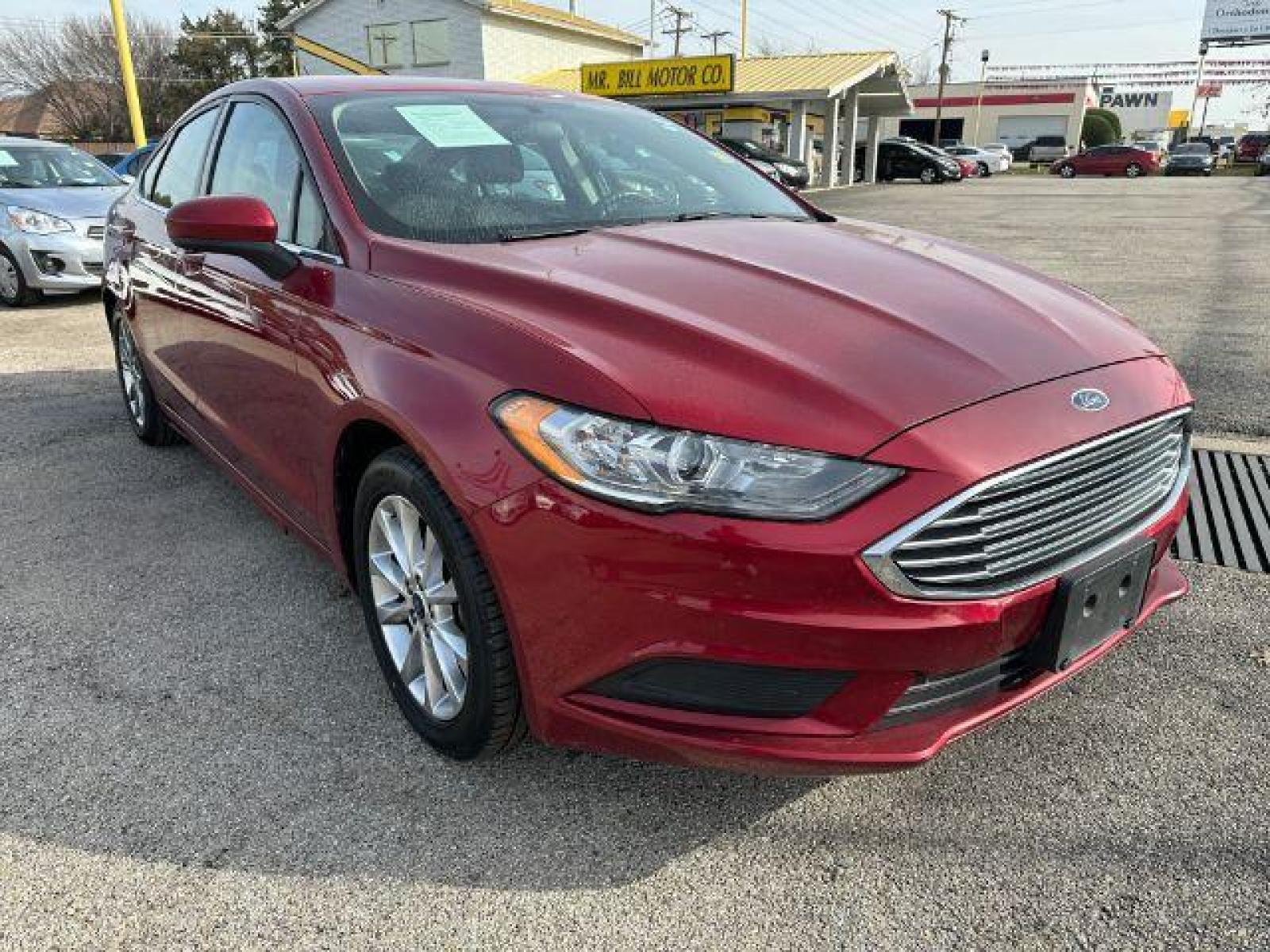 2017 RED Ford FUS SE (3FA6P0HD0HR) with an 1.5L L4 DOHC 16V engine, 6-Speed Automatic transmission, located at 2715 W Pioneer Pkwy, Arlington, TX, 76013, (817) 265-9009, 32.710262, -97.153236 - Photo #4