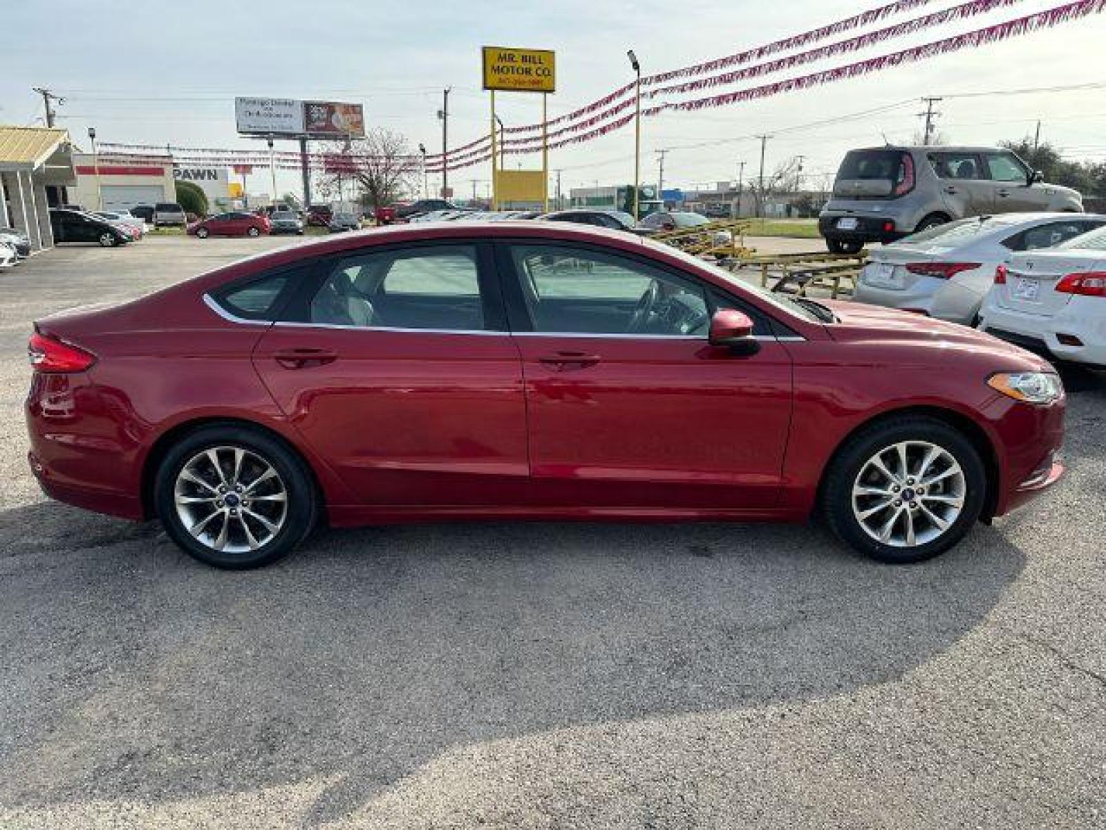 2017 RED Ford FUS SE (3FA6P0HD0HR) with an 1.5L L4 DOHC 16V engine, 6-Speed Automatic transmission, located at 2715 W Pioneer Pkwy, Arlington, TX, 76013, (817) 265-9009, 32.710262, -97.153236 - Photo #5