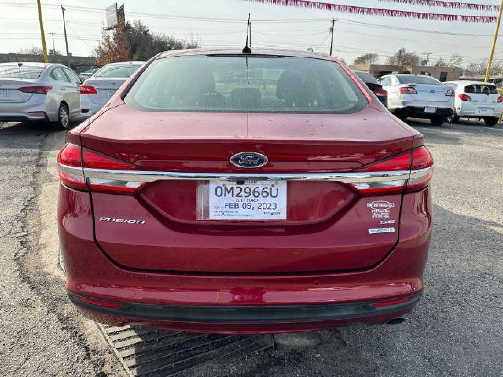 2017 RED Ford FUS SE (3FA6P0HD0HR) with an 1.5L L4 DOHC 16V engine, 6-Speed Automatic transmission, located at 2715 W Pioneer Pkwy, Arlington, TX, 76013, (817) 265-9009, 32.710262, -97.153236 - Photo #7