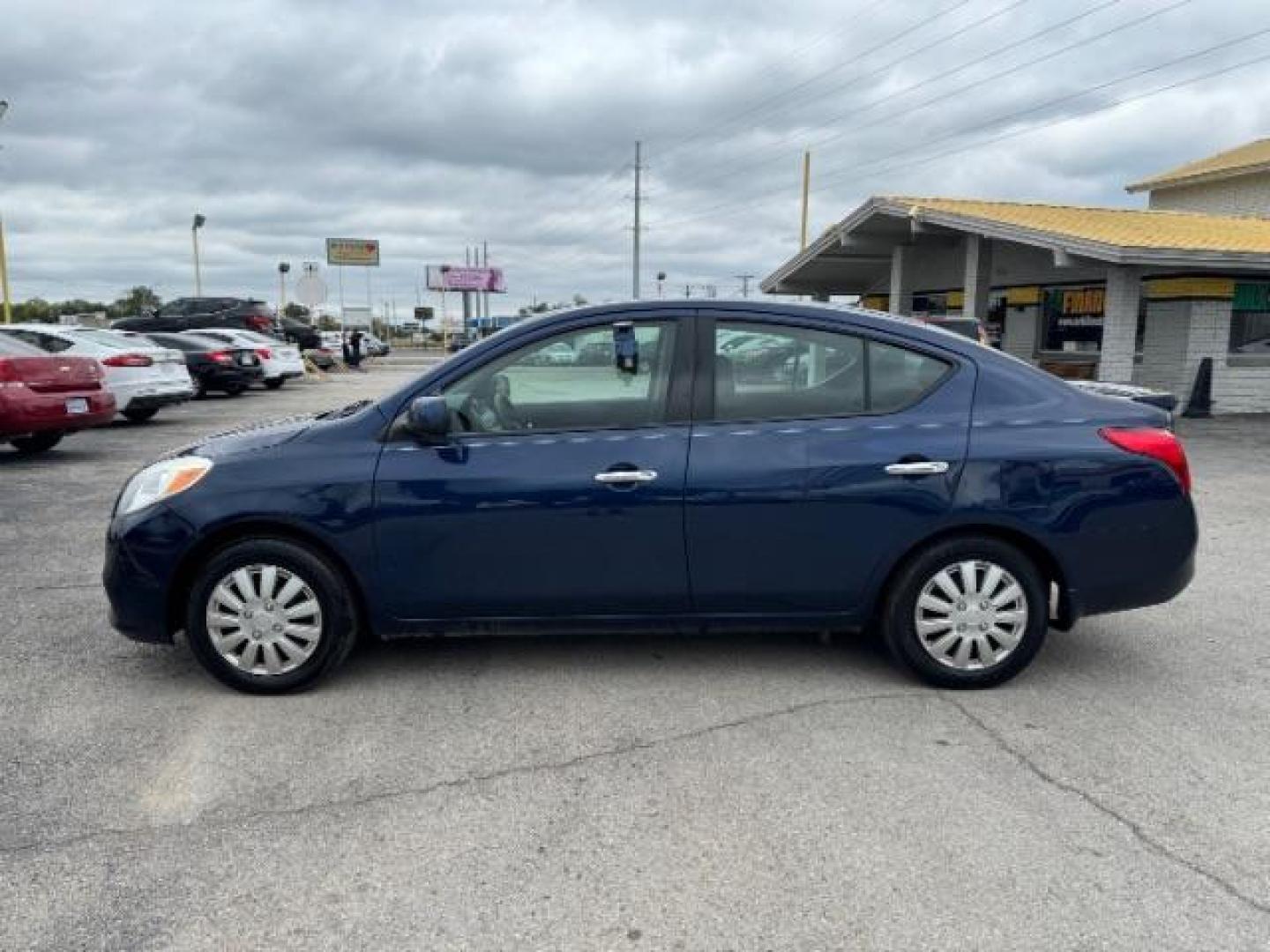 2014 BLUE Nissan Versa 1.6 SL Sedan (3N1CN7APXEK) with an 1.6L L4 DOHC 16V engine, Continuously Variabl transmission, located at 2715 W Pioneer Pkwy, Arlington, TX, 76013, (817) 265-9009, 32.710262, -97.153236 - Photo#1