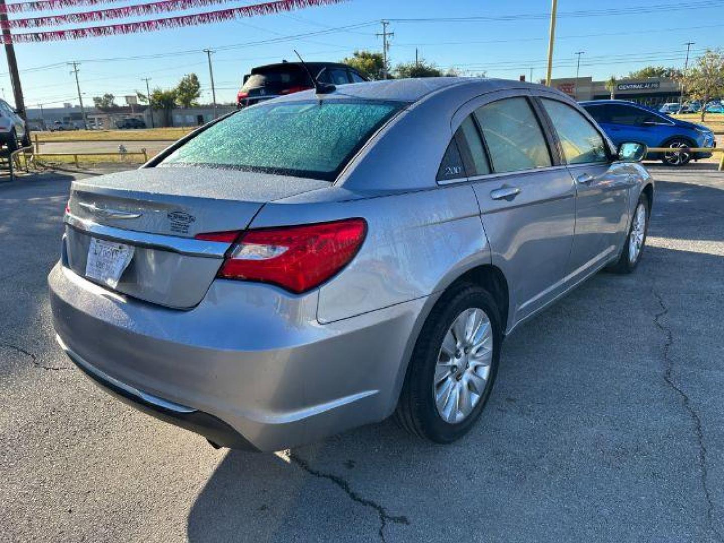 2014 Billet Silver Metall Chrysler 200 LX (1C3CCBABXEN) with an 2.4L L4 DOHC 16V engine, 6-Speed Automatic transmission, located at 2715 W Pioneer Pkwy, Arlington, TX, 76013, (817) 265-9009, 32.710262, -97.153236 - Photo#6