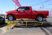 2014 Red RAM 1500 SLT Quad Cab 2WD (1C6RR6GT3ES) with an 5.7L V8 OHV 16V engine, 8-Speed Automatic transmission, located at 2715 W Pioneer Pkwy, Arlington, TX, 76013, (817) 265-9009, 32.710262, -97.153236- Photo#1