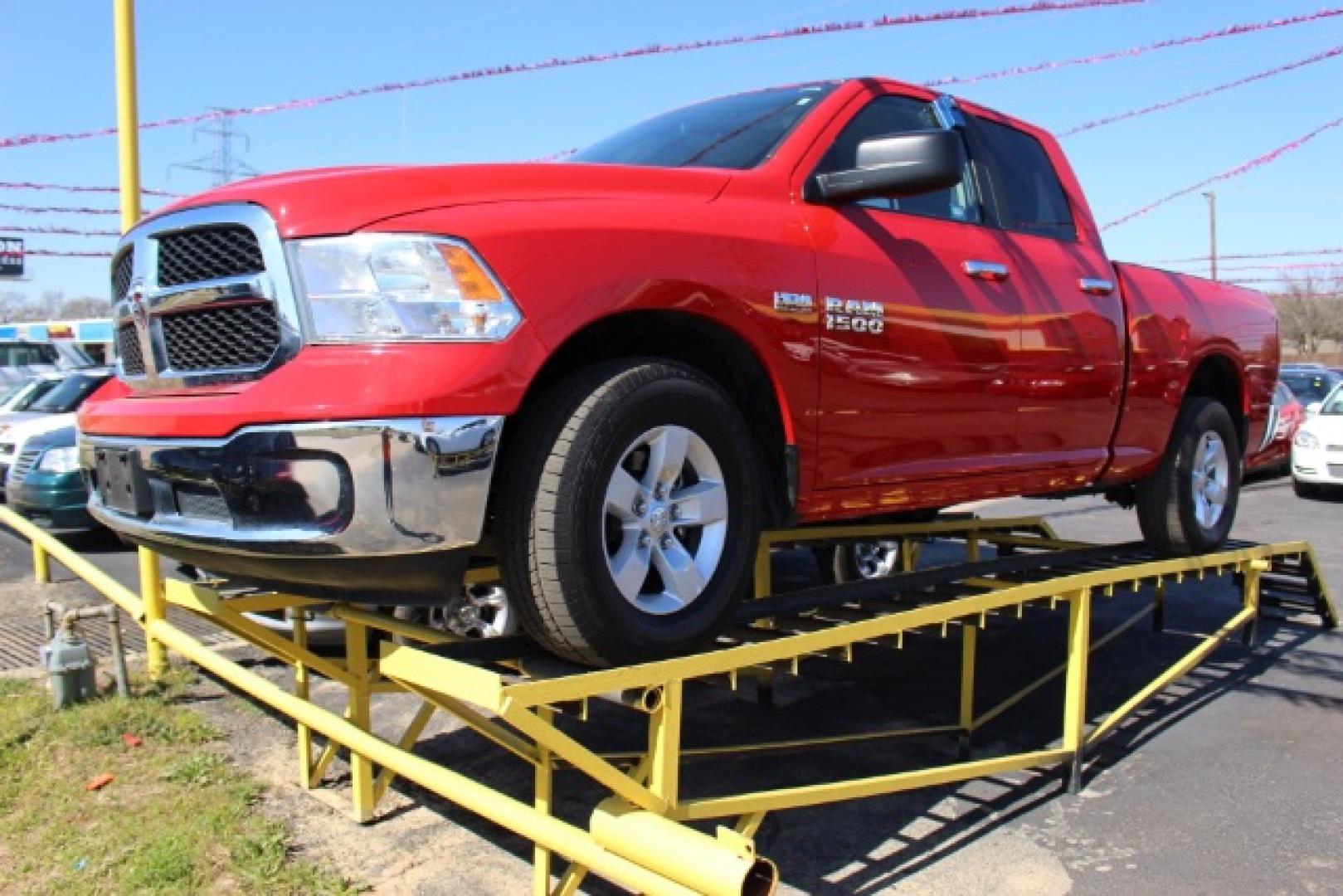 2014 Red RAM 1500 SLT Quad Cab 2WD (1C6RR6GT3ES) with an 5.7L V8 OHV 16V engine, 8-Speed Automatic transmission, located at 2715 W Pioneer Pkwy, Arlington, TX, 76013, (817) 265-9009, 32.710262, -97.153236- Photo#2