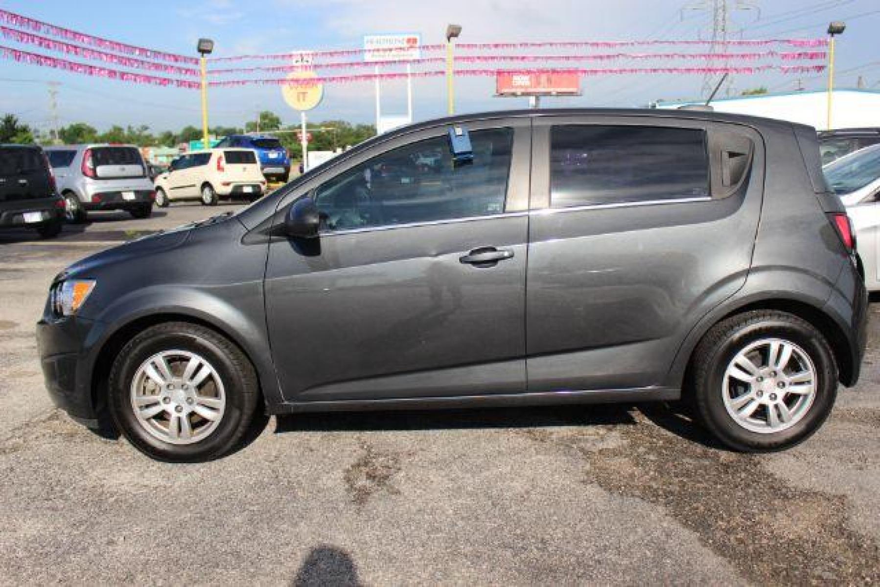 2016 Nightfall Gray Metal Chevrolet Sonic LT Auto 5-Door (1G1JC6SH8G4) with an 1.8L L4 DOHC 24V engine, 6-Speed Automatic transmission, located at 2715 W Pioneer Pkwy, Arlington, TX, 76013, (817) 265-9009, 32.710262, -97.153236 - Photo #1
