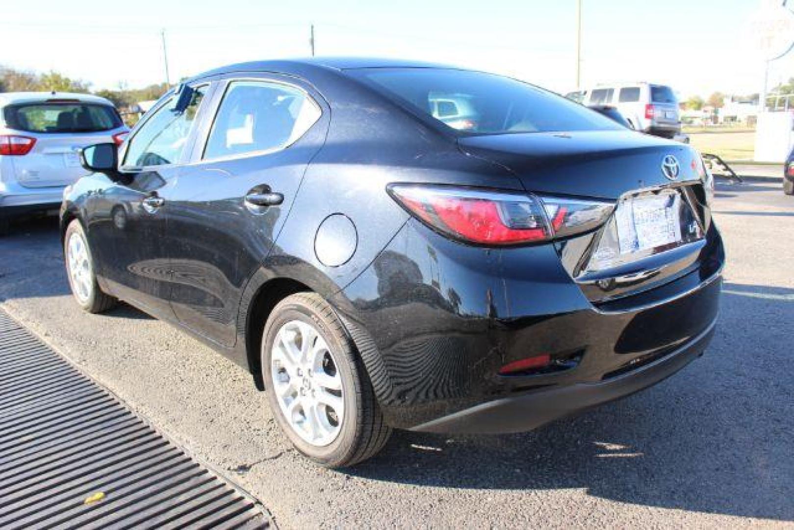 2018 BLACK Toyota Yaris iA 6A (3MYDLBYV2JY) with an 1.5L L4 DOHC 16V engine, 6-Speed Automatic transmission, located at 2715 W Pioneer Pkwy, Arlington, TX, 76013, (817) 265-9009, 32.710262, -97.153236 - Photo#7