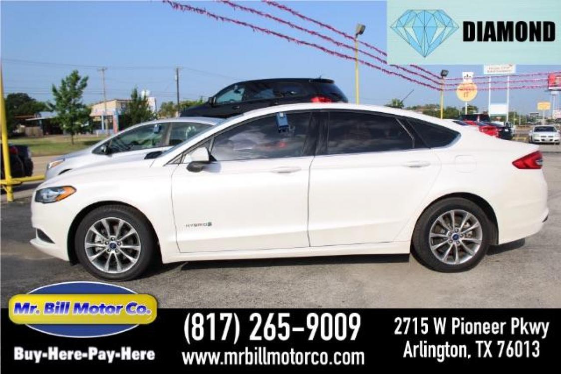 2017 WHITE Ford Fusion Hybrid SE (3FA6P0LU7HR) with an 2.0L L4 DOHC 16V HYBRID engine, Continuously Variable Transmission transmission, located at 2715 W Pioneer Pkwy, Arlington, TX, 76013, (817) 265-9009, 32.710262, -97.153236 - Photo #0