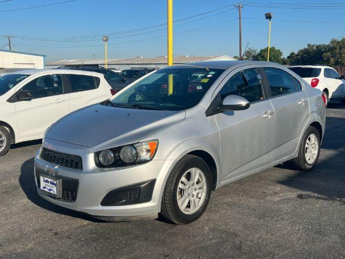 2014 SILVER Chevrolet Sonic LT Auto Sedan (1G1JC5SH3E4) with an 1.8L L4 DOHC 24V engine, 6-Speed Automatic transmission, located at 2715 W Pioneer Pkwy, Arlington, TX, 76013, (817) 265-9009, 32.710262, -97.153236 - Photo#2
