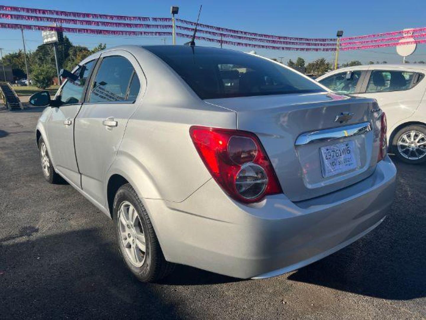 2014 SILVER Chevrolet Sonic LT Auto Sedan (1G1JC5SH3E4) with an 1.8L L4 DOHC 24V engine, 6-Speed Automatic transmission, located at 2715 W Pioneer Pkwy, Arlington, TX, 76013, (817) 265-9009, 32.710262, -97.153236 - Photo#7