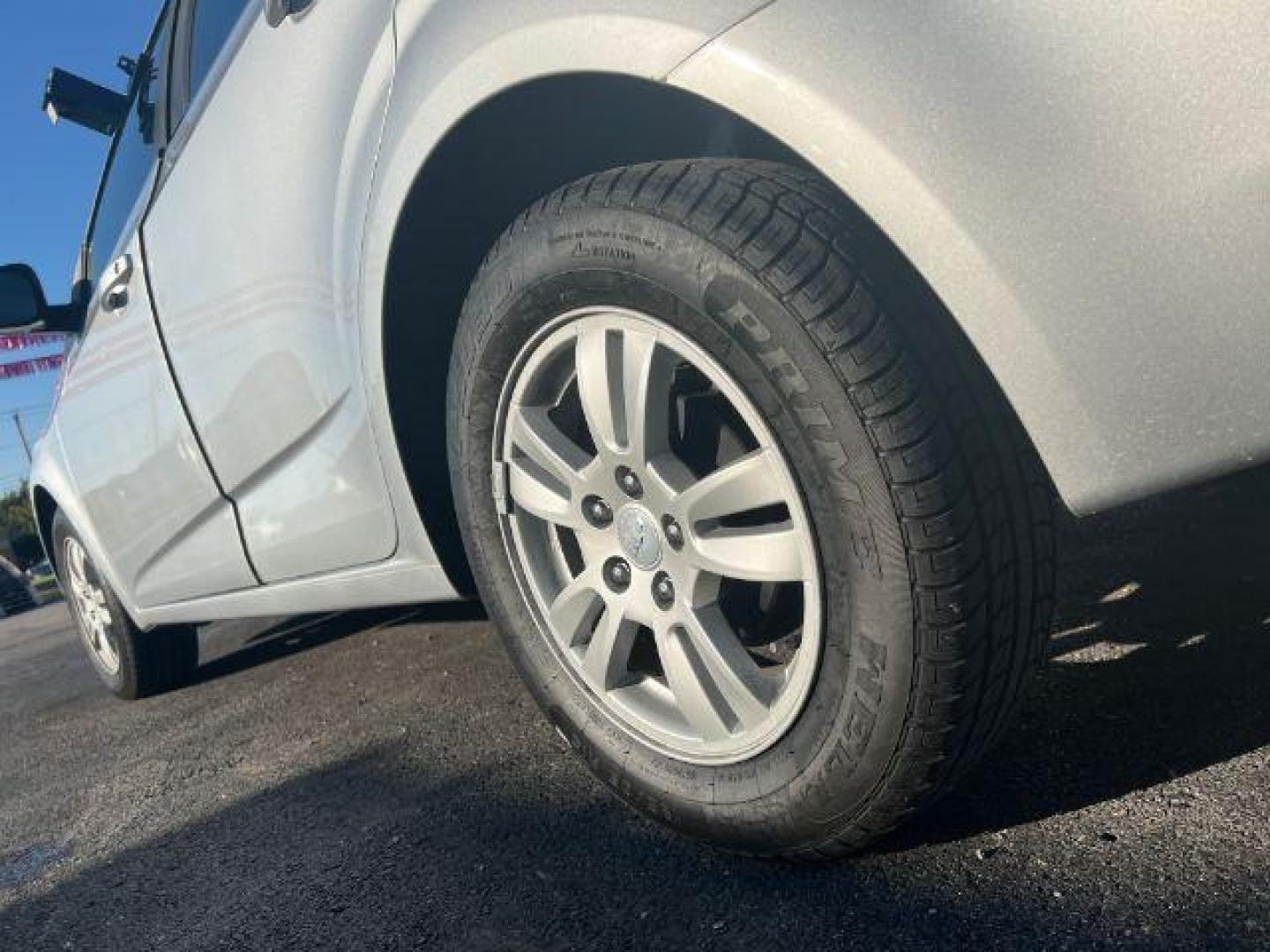 2014 SILVER Chevrolet Sonic LT Auto Sedan (1G1JC5SH3E4) with an 1.8L L4 DOHC 24V engine, 6-Speed Automatic transmission, located at 2715 W Pioneer Pkwy, Arlington, TX, 76013, (817) 265-9009, 32.710262, -97.153236 - Photo#8