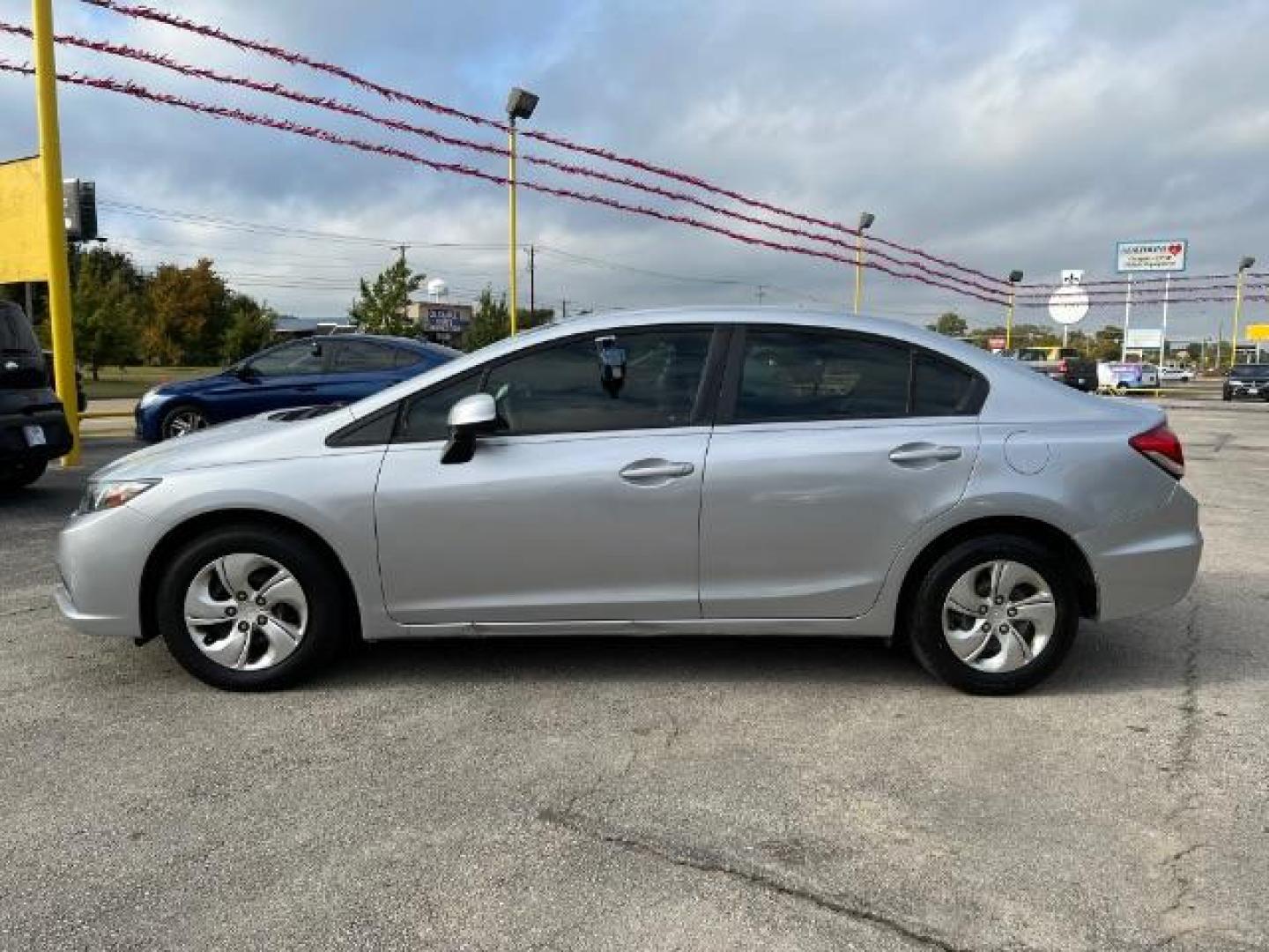 2013 SILVER Honda Civic LX Sedan 5-Speed AT (2HGFB2F59DH) with an 1.8L L4 SOHC 16V engine, 5-Speed Automatic transmission, located at 2715 W Pioneer Pkwy, Arlington, TX, 76013, (817) 265-9009, 32.710262, -97.153236 - Photo#1