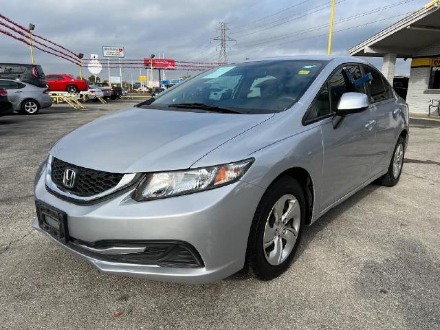 2013 SILVER Honda Civic LX Sedan 5-Speed AT (2HGFB2F59DH) with an 1.8L L4 SOHC 16V engine, 5-Speed Automatic transmission, located at 2715 W Pioneer Pkwy, Arlington, TX, 76013, (817) 265-9009, 32.710262, -97.153236 - Photo#2