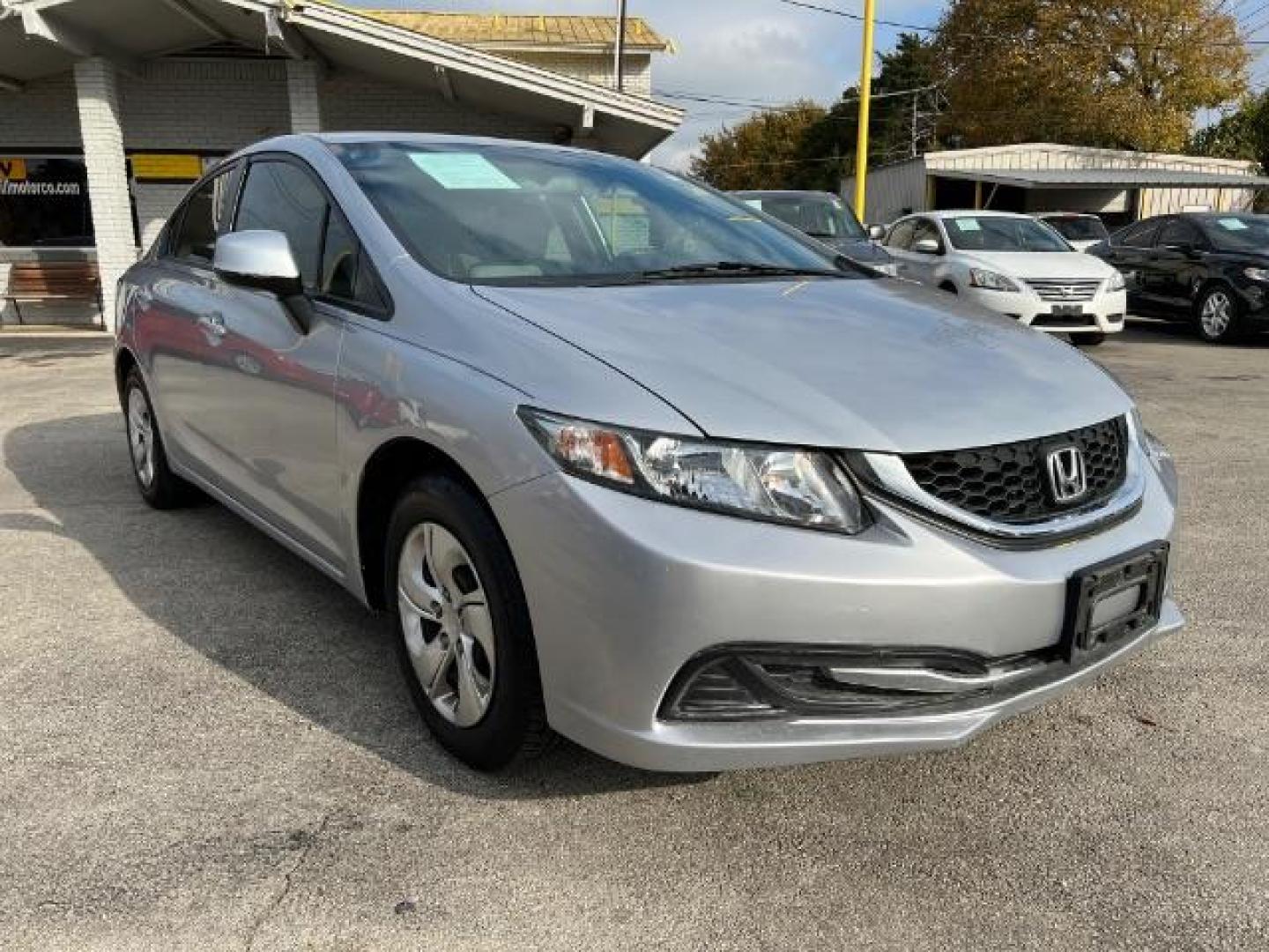 2013 SILVER Honda Civic LX Sedan 5-Speed AT (2HGFB2F59DH) with an 1.8L L4 SOHC 16V engine, 5-Speed Automatic transmission, located at 2715 W Pioneer Pkwy, Arlington, TX, 76013, (817) 265-9009, 32.710262, -97.153236 - Photo#4
