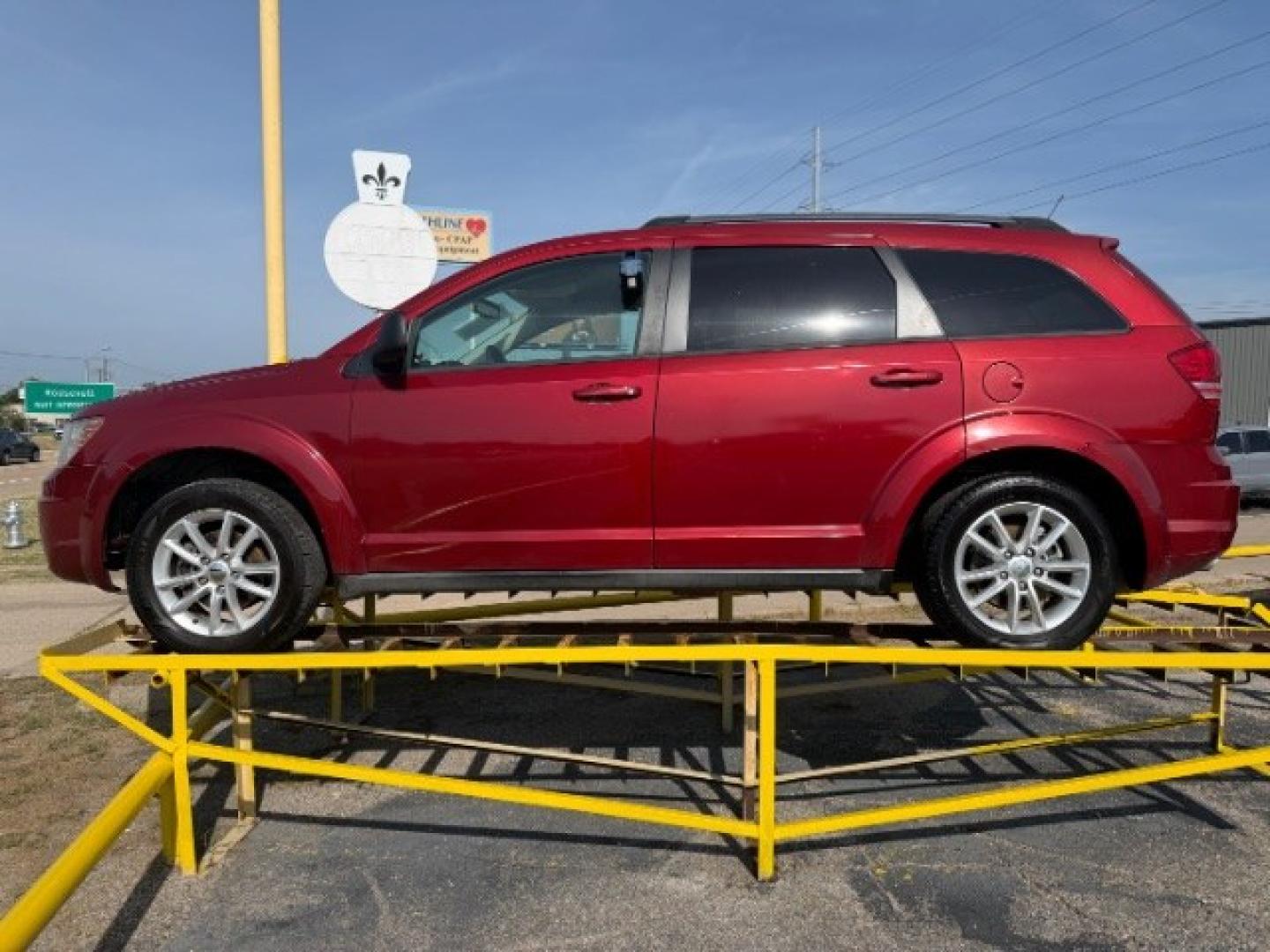 2010 Red Dodge Journey SXT (3D4PG5FV6AT) with an 3.5L V6 SOHC 24V engine, 6-Speed Automatic transmission, located at 2715 W Pioneer Pkwy, Arlington, TX, 76013, (817) 265-9009, 32.710262, -97.153236- Photo#2