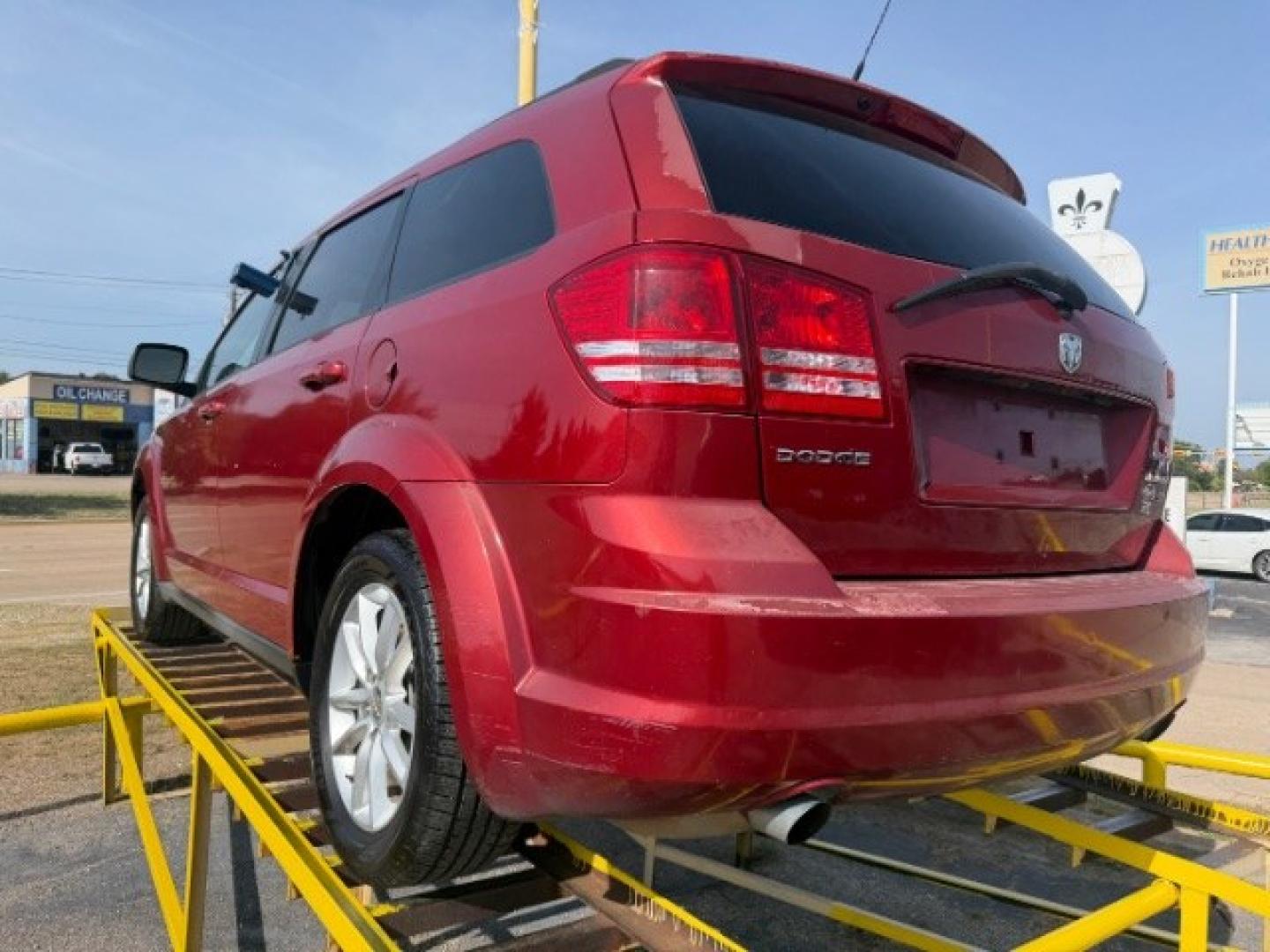 2010 Red Dodge Journey SXT (3D4PG5FV6AT) with an 3.5L V6 SOHC 24V engine, 6-Speed Automatic transmission, located at 2715 W Pioneer Pkwy, Arlington, TX, 76013, (817) 265-9009, 32.710262, -97.153236- Photo#9