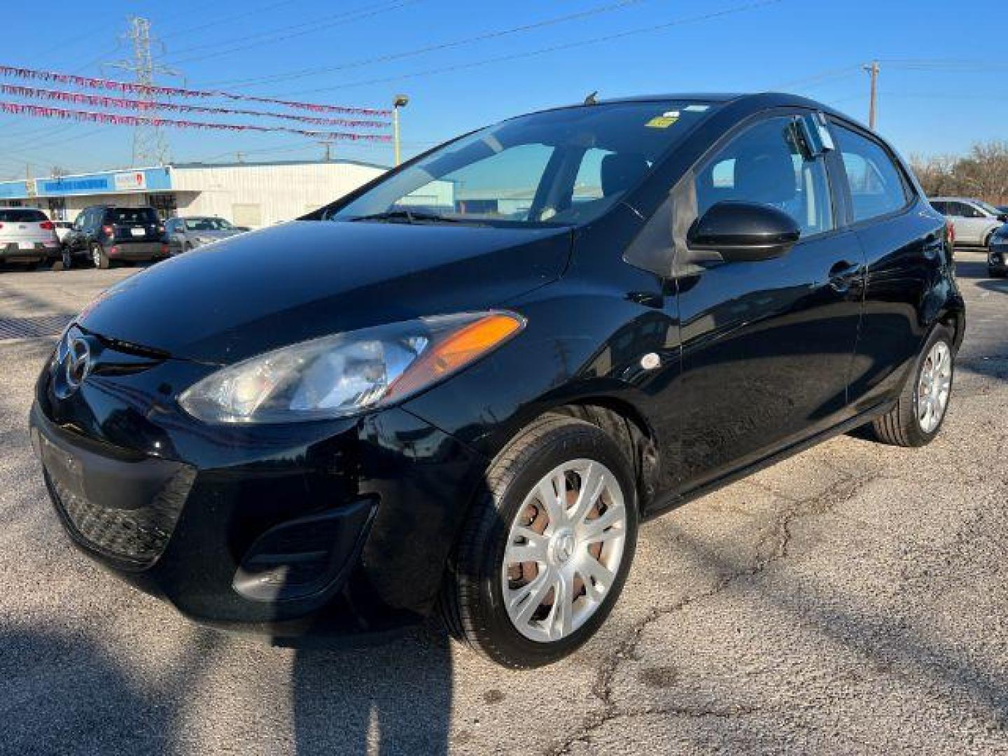 2014 BLACK Mazda MAZDA2 Sport AT (JM1DE1KZ9E0) with an 1.5L L4 DOHC 16V engine, 4-Speed Automatic transmission, located at 2715 W Pioneer Pkwy, Arlington, TX, 76013, (817) 265-9009, 32.710262, -97.153236 - Photo#2