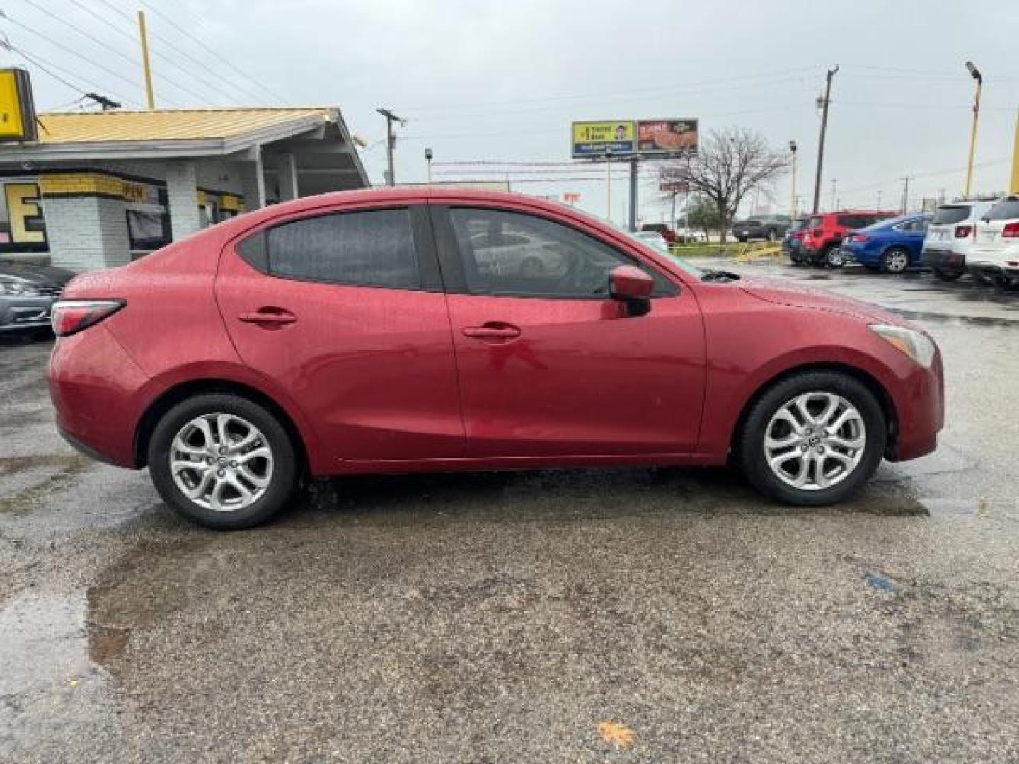 2016 RED Scion iA 6A (3MYDLBZV5GY) with an 1.5L L4 DOHC 16V engine, 6-Speed Automatic transmission, located at 2715 W Pioneer Pkwy, Arlington, TX, 76013, (817) 265-9009, 32.710262, -97.153236 - Photo#4