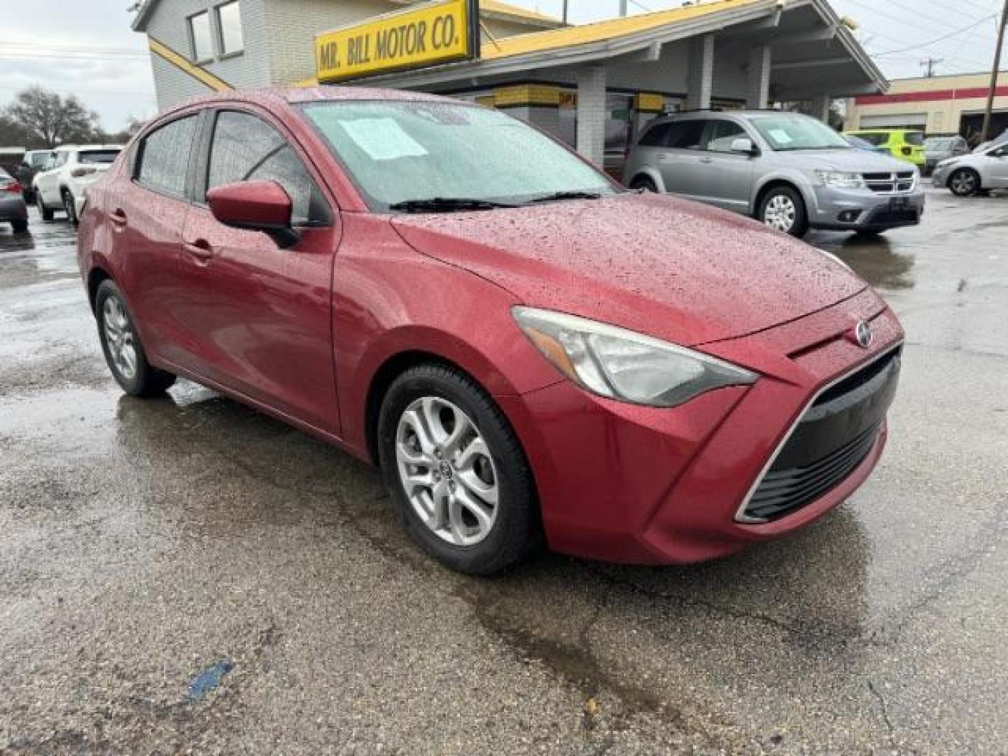 2016 RED Scion iA 6A (3MYDLBZV5GY) with an 1.5L L4 DOHC 16V engine, 6-Speed Automatic transmission, located at 2715 W Pioneer Pkwy, Arlington, TX, 76013, (817) 265-9009, 32.710262, -97.153236 - Photo#5