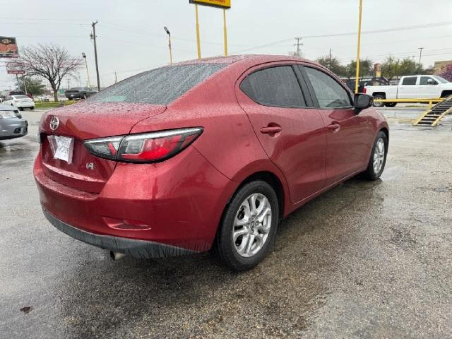 2016 RED Scion iA 6A (3MYDLBZV5GY) with an 1.5L L4 DOHC 16V engine, 6-Speed Automatic transmission, located at 2715 W Pioneer Pkwy, Arlington, TX, 76013, (817) 265-9009, 32.710262, -97.153236 - Photo#6