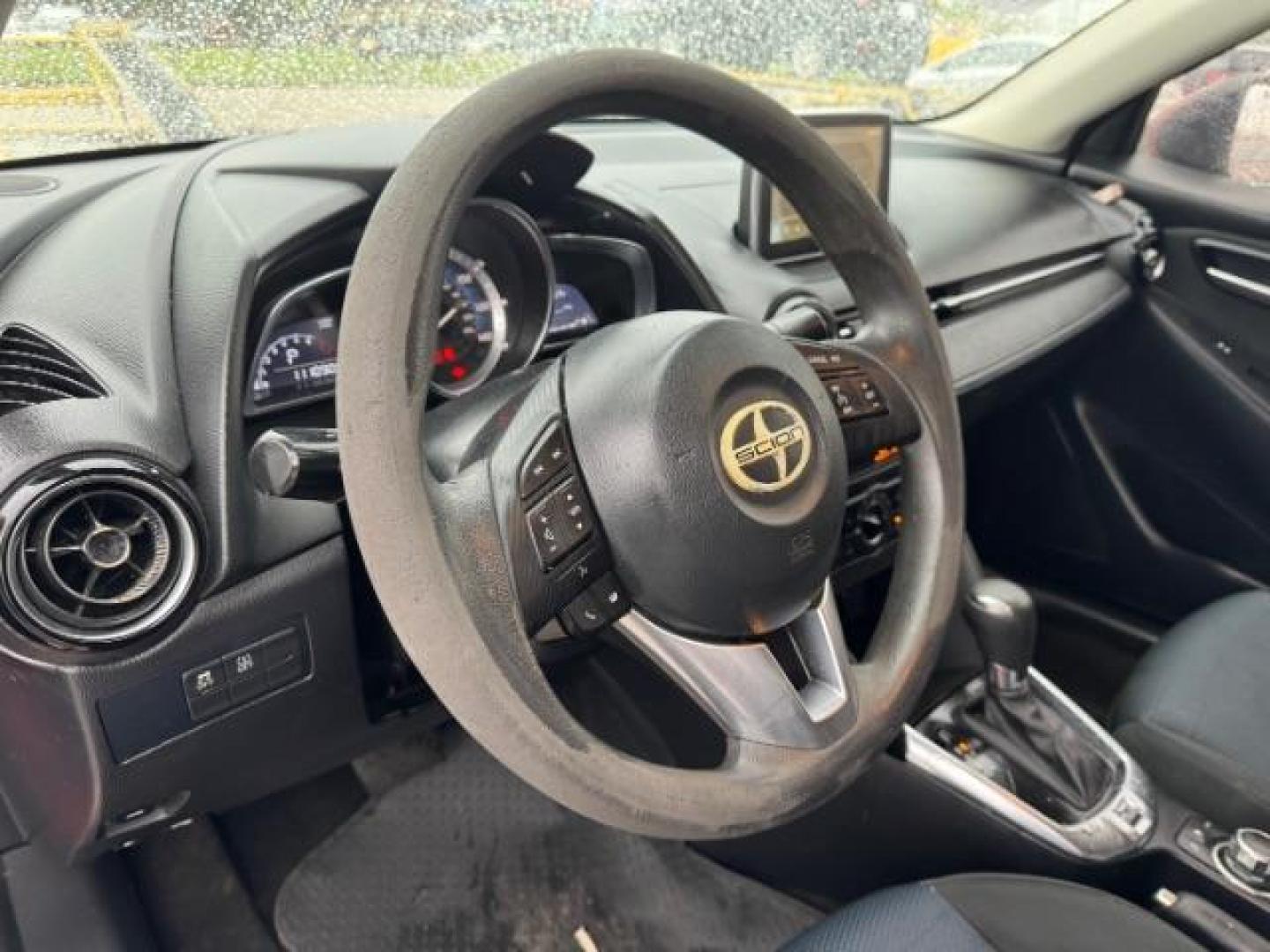 2016 RED Scion iA 6A (3MYDLBZV5GY) with an 1.5L L4 DOHC 16V engine, 6-Speed Automatic transmission, located at 2715 W Pioneer Pkwy, Arlington, TX, 76013, (817) 265-9009, 32.710262, -97.153236 - Photo#14