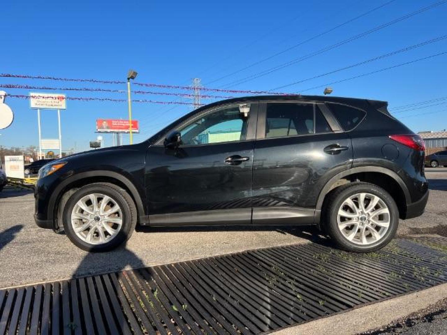 2014 BLACK Mazda CX-5 Grand Touring (JM3KE2DYXE0) with an 2.5L L4 DOHC 16V engine, 6-Speed Automatic transmission, located at 2715 W Pioneer Pkwy, Arlington, TX, 76013, (817) 265-9009, 32.710262, -97.153236 - Photo#1