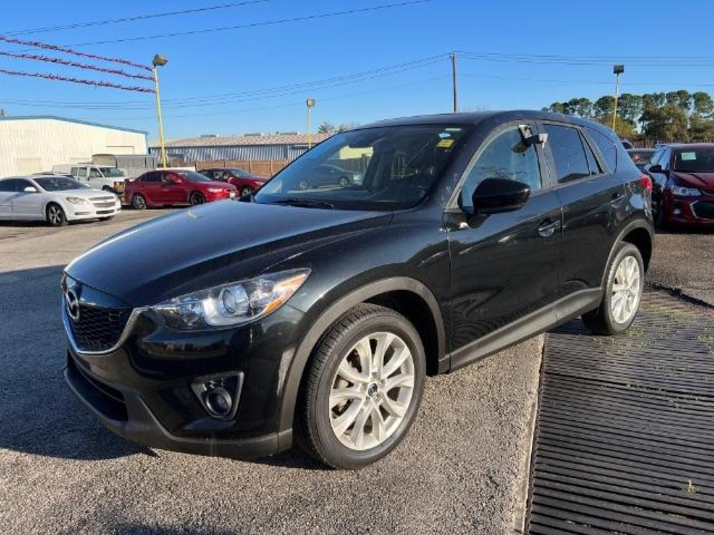 2014 BLACK Mazda CX-5 Grand Touring (JM3KE2DYXE0) with an 2.5L L4 DOHC 16V engine, 6-Speed Automatic transmission, located at 2715 W Pioneer Pkwy, Arlington, TX, 76013, (817) 265-9009, 32.710262, -97.153236 - Photo#2