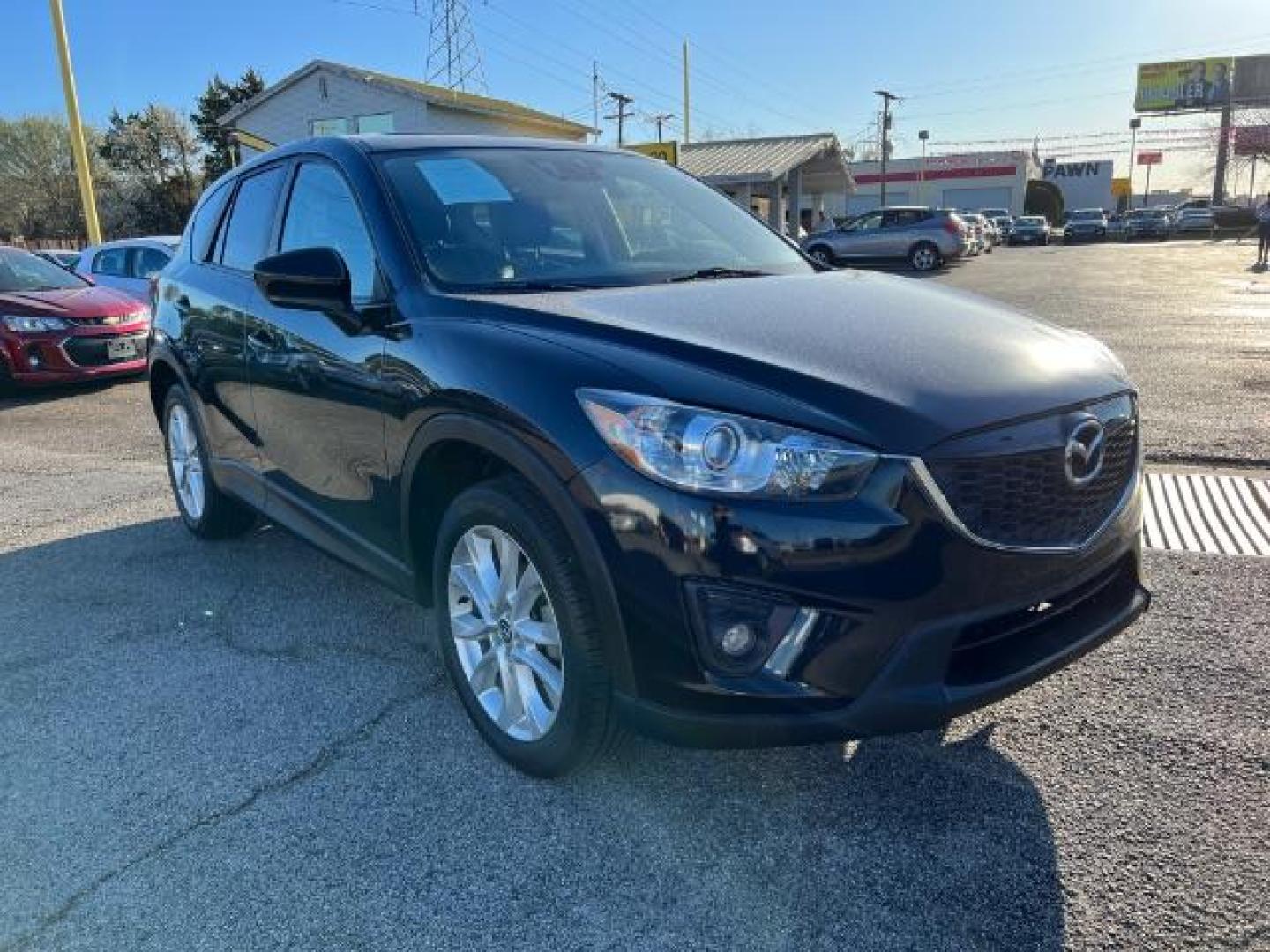 2014 BLACK Mazda CX-5 Grand Touring (JM3KE2DYXE0) with an 2.5L L4 DOHC 16V engine, 6-Speed Automatic transmission, located at 2715 W Pioneer Pkwy, Arlington, TX, 76013, (817) 265-9009, 32.710262, -97.153236 - Photo#4