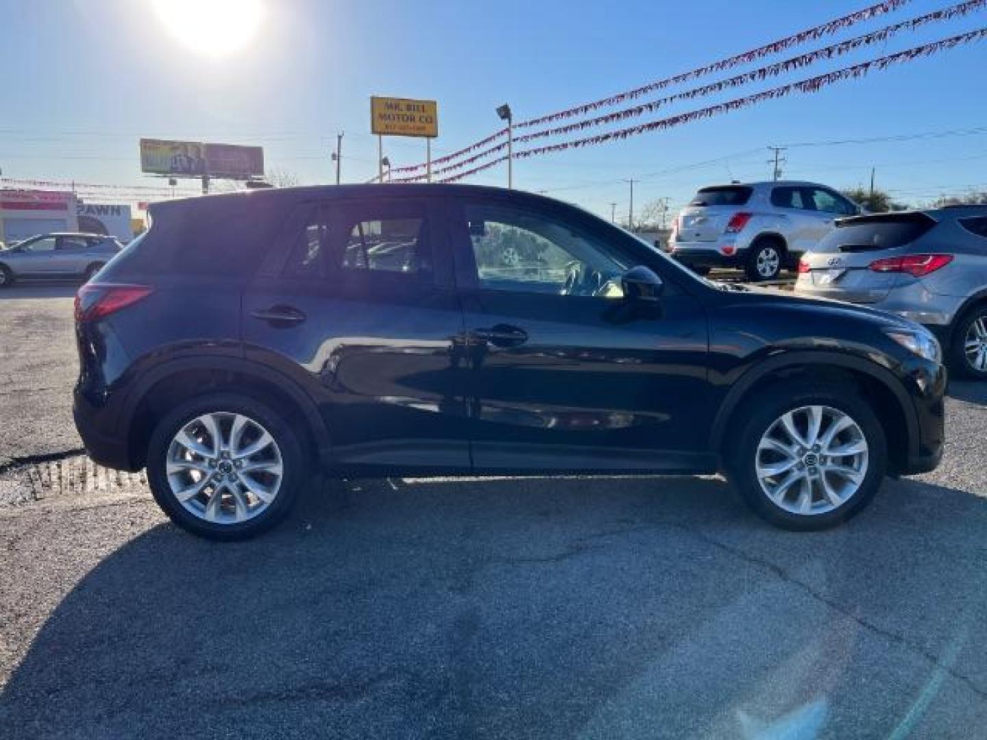 2014 BLACK Mazda CX-5 Grand Touring (JM3KE2DYXE0) with an 2.5L L4 DOHC 16V engine, 6-Speed Automatic transmission, located at 2715 W Pioneer Pkwy, Arlington, TX, 76013, (817) 265-9009, 32.710262, -97.153236 - Photo#5