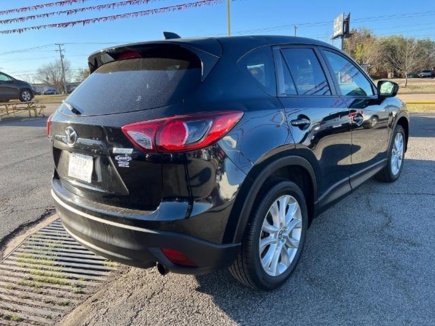 2014 BLACK Mazda CX-5 Grand Touring (JM3KE2DYXE0) with an 2.5L L4 DOHC 16V engine, 6-Speed Automatic transmission, located at 2715 W Pioneer Pkwy, Arlington, TX, 76013, (817) 265-9009, 32.710262, -97.153236 - Photo#6