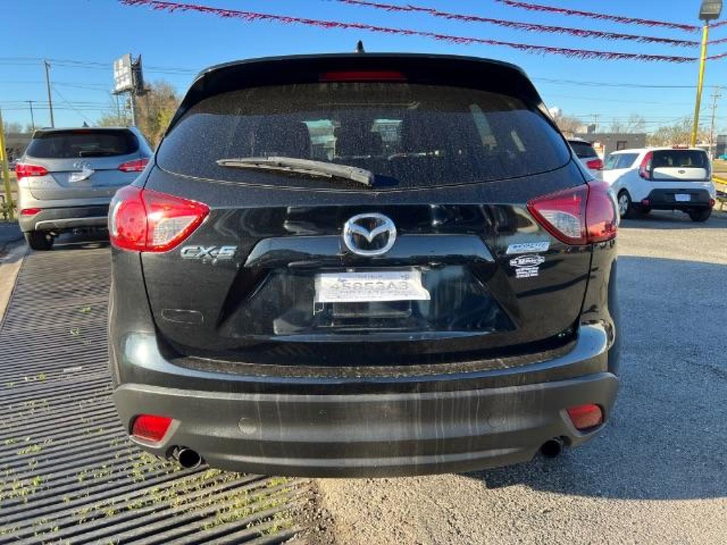 2014 BLACK Mazda CX-5 Grand Touring (JM3KE2DYXE0) with an 2.5L L4 DOHC 16V engine, 6-Speed Automatic transmission, located at 2715 W Pioneer Pkwy, Arlington, TX, 76013, (817) 265-9009, 32.710262, -97.153236 - Photo#7