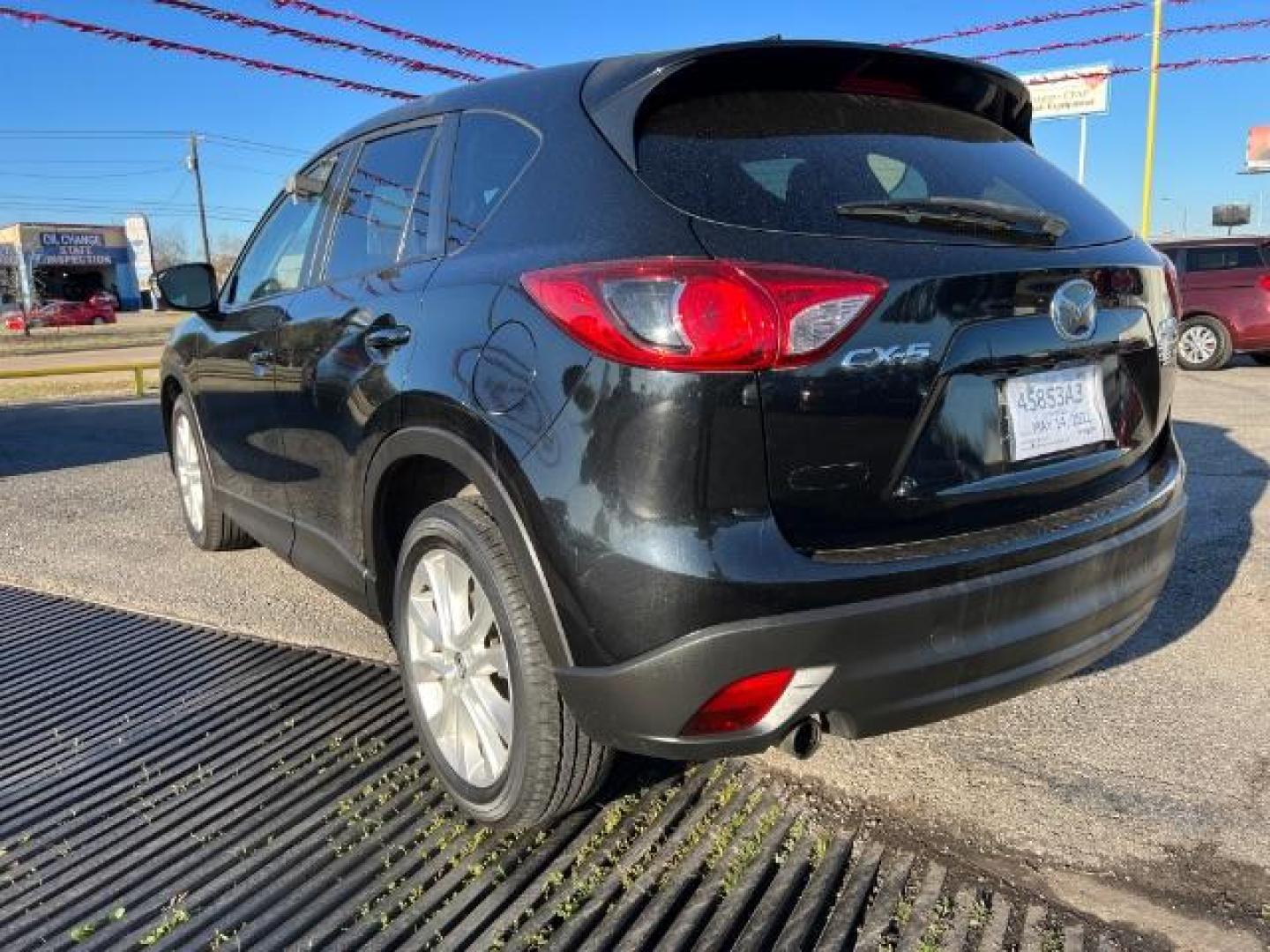 2014 BLACK Mazda CX-5 Grand Touring (JM3KE2DYXE0) with an 2.5L L4 DOHC 16V engine, 6-Speed Automatic transmission, located at 2715 W Pioneer Pkwy, Arlington, TX, 76013, (817) 265-9009, 32.710262, -97.153236 - Photo#8
