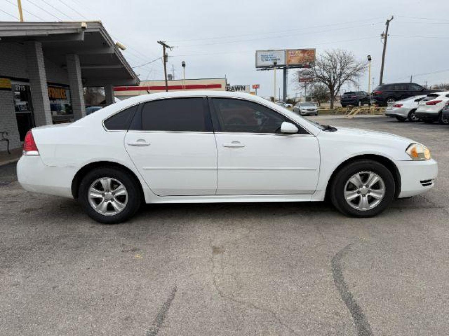 2012 White Chevrolet Impala LS (2G1WA5E35C1) with an 3.6L V6 DOHC 16V FFV engine, 6-Speed Automatic transmission, located at 2715 W Pioneer Pkwy, Arlington, TX, 76013, (817) 265-9009, 32.710262, -97.153236 - Photo#5