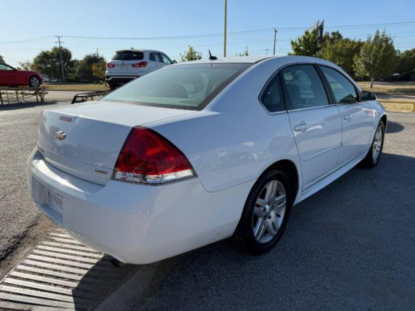 2014 WHITE Chevrolet Impala Limited LT (2G1WB5E3XE1) with an 3.6L V6 DOHC 16V FFV engine, 6-Speed Automatic transmission, located at 2715 W Pioneer Pkwy, Arlington, TX, 76013, (817) 265-9009, 32.710262, -97.153236 - Photo#7