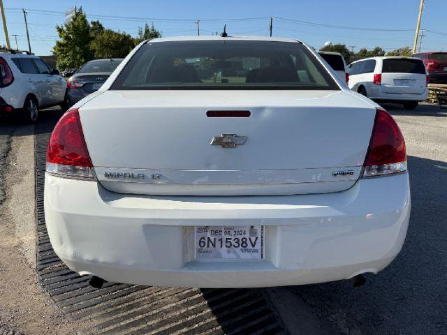 2014 WHITE Chevrolet Impala Limited LT (2G1WB5E3XE1) with an 3.6L V6 DOHC 16V FFV engine, 6-Speed Automatic transmission, located at 2715 W Pioneer Pkwy, Arlington, TX, 76013, (817) 265-9009, 32.710262, -97.153236 - Photo#8