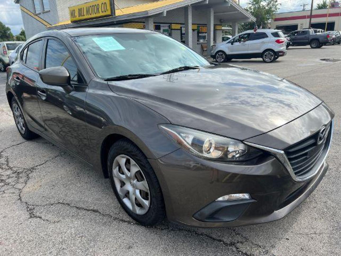 2016 GRAY Mazda MAZDA3 SEDAN 4-DR (JM1BM1J73G1) with an 2.0L L4 DOHC 16V engine, 6-Speed Automatic transmission, located at 2715 W Pioneer Pkwy, Arlington, TX, 76013, (817) 265-9009, 32.710262, -97.153236 - Photo#4