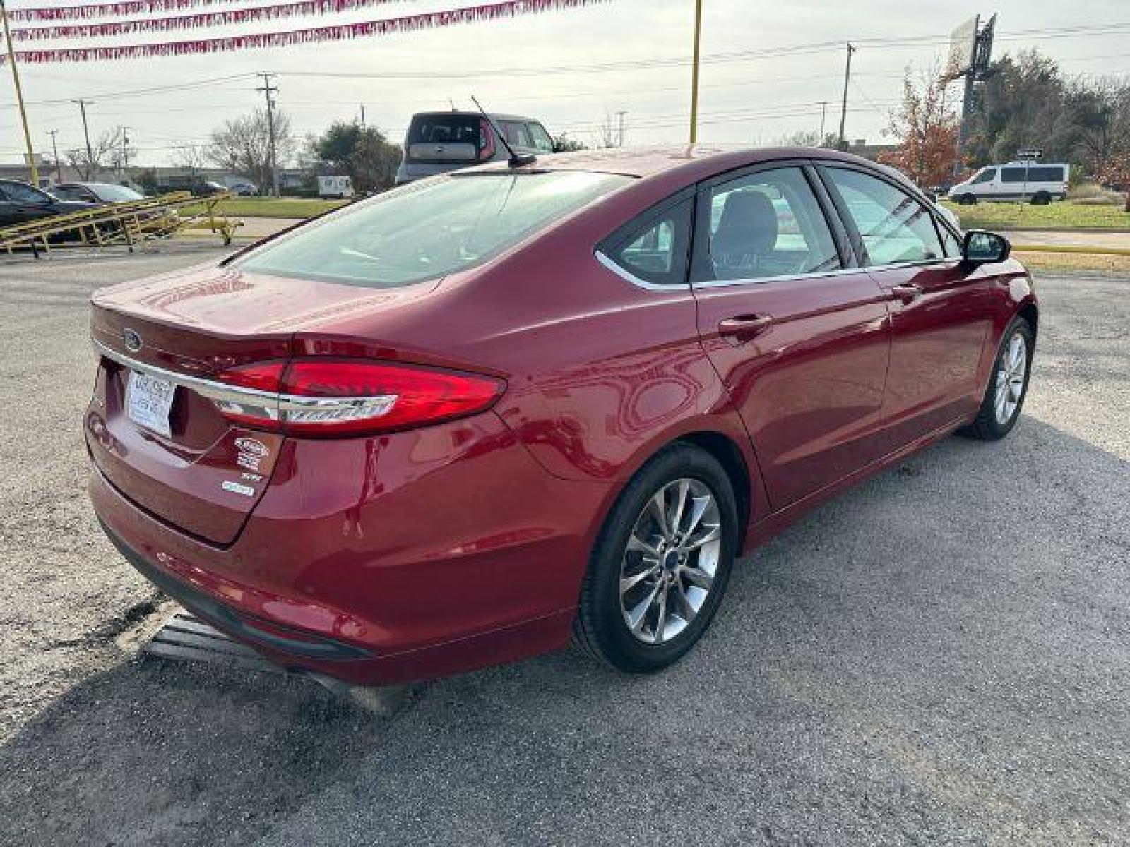 2017 RED Ford FUS SE (3FA6P0HD0HR) with an 1.5L L4 DOHC 16V engine, 6-Speed Automatic transmission, located at 2715 W Pioneer Pkwy, Arlington, TX, 76013, (817) 265-9009, 32.710262, -97.153236 - Photo #6