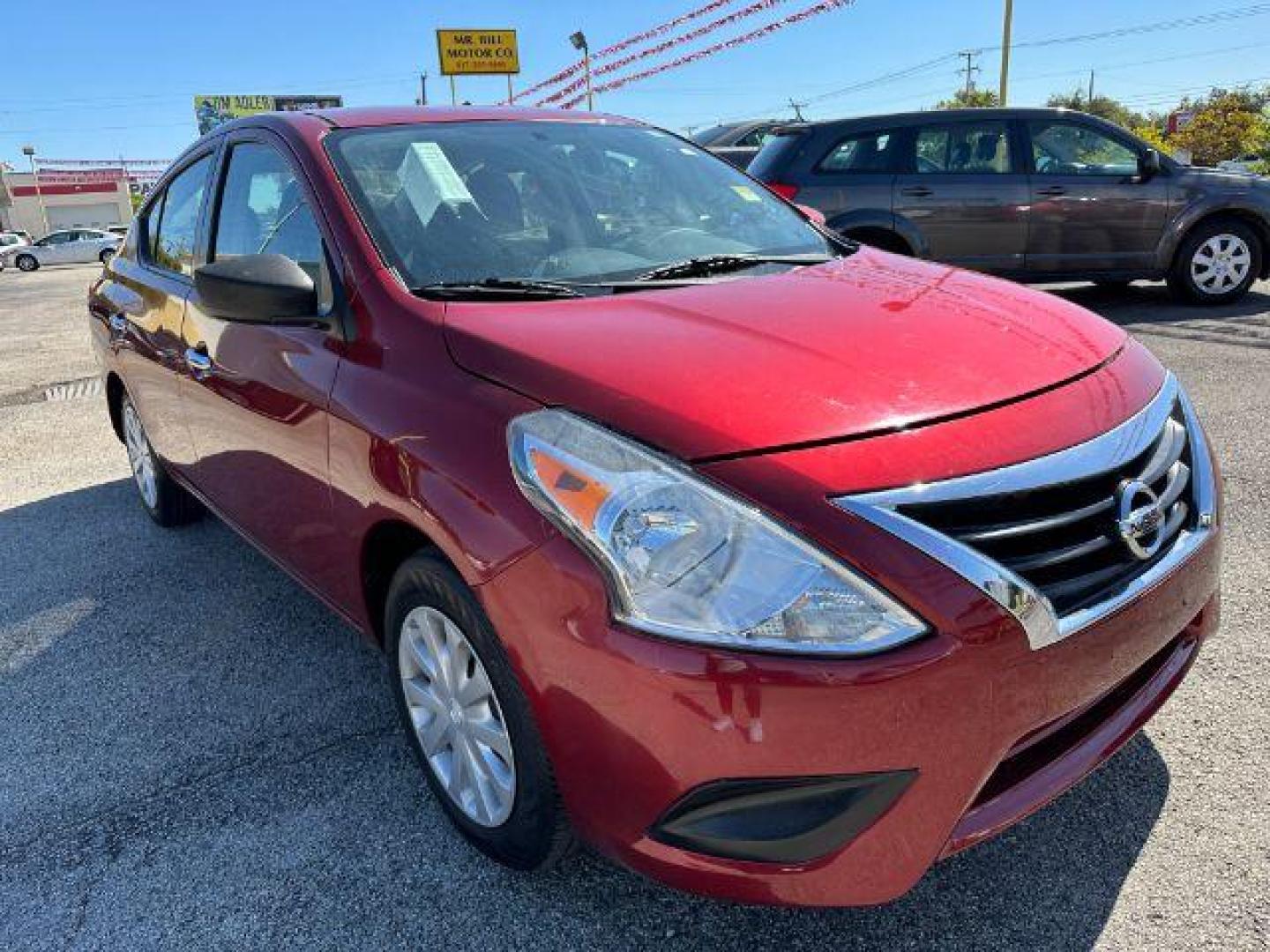 2017 Red Nissan Versa 1.6 S 4A (3N1CN7APXHK) with an 1.6L L4 DOHC 16V engine, 4-Speed Automatic transmission, located at 2715 W Pioneer Pkwy, Arlington, TX, 76013, (817) 265-9009, 32.710262, -97.153236 - Photo#4