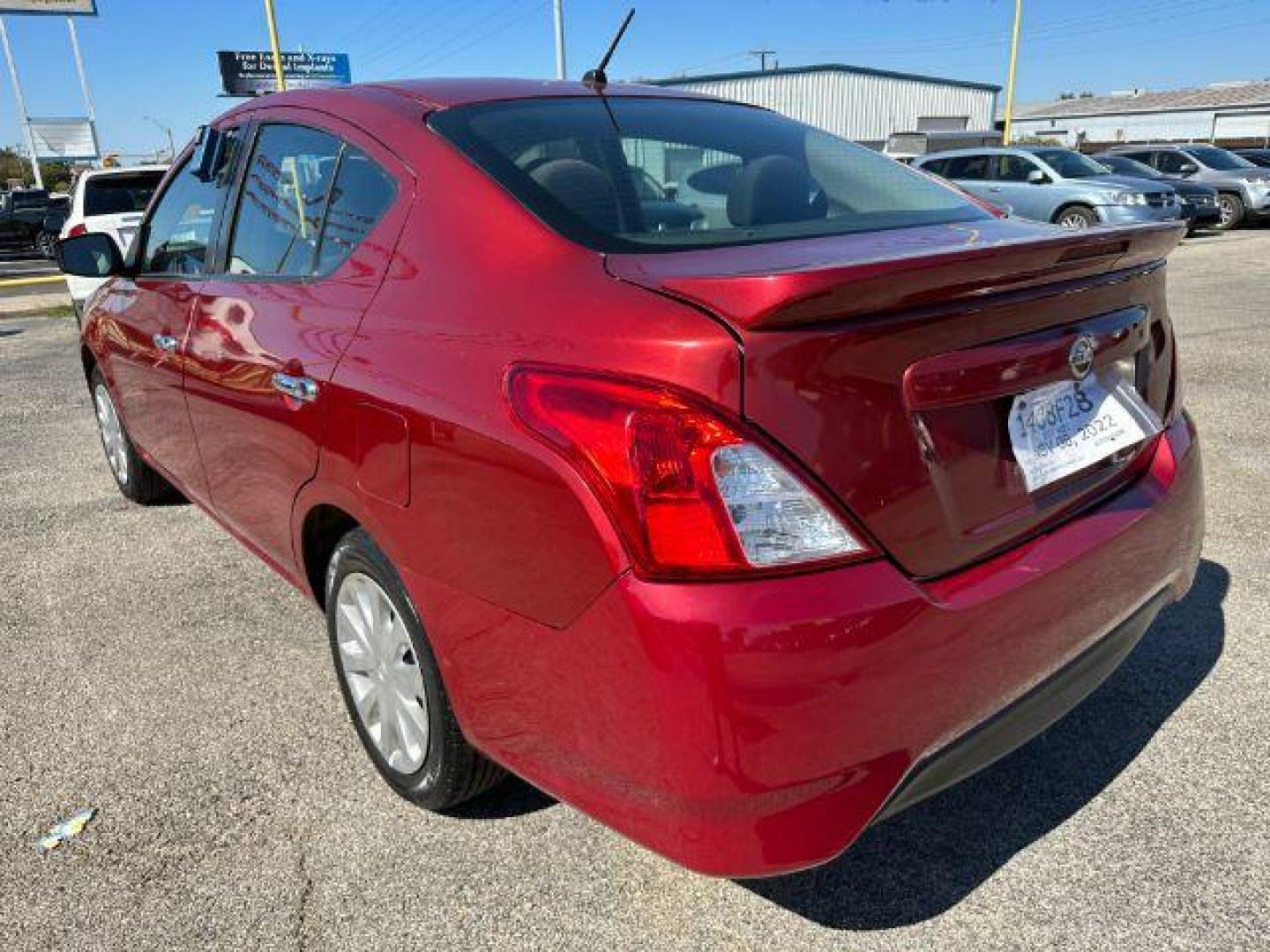 2017 Red Nissan Versa 1.6 S 4A (3N1CN7APXHK) with an 1.6L L4 DOHC 16V engine, 4-Speed Automatic transmission, located at 2715 W Pioneer Pkwy, Arlington, TX, 76013, (817) 265-9009, 32.710262, -97.153236 - Photo#7