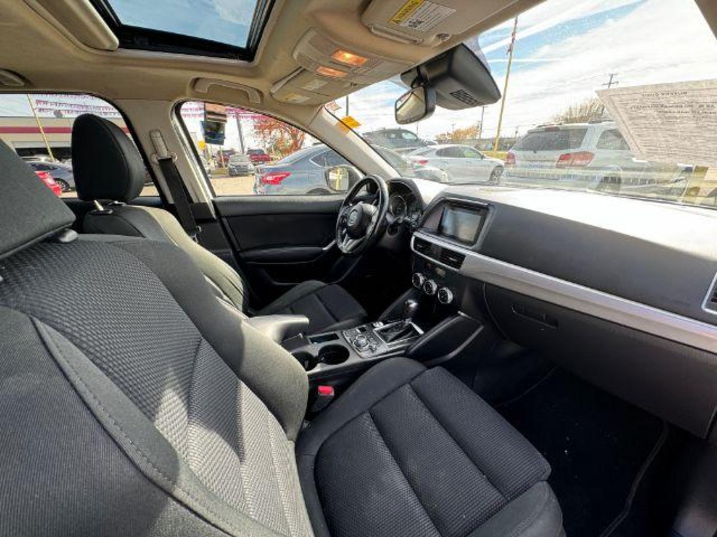 2016 White Mazda CX-5 Touring (JM3KE2CY5G0) with an 2.5L L4 DOHC 16V engine, 6-Speed Automatic transmission, located at 2715 W Pioneer Pkwy, Arlington, TX, 76013, (817) 265-9009, 32.710262, -97.153236 - Photo#10