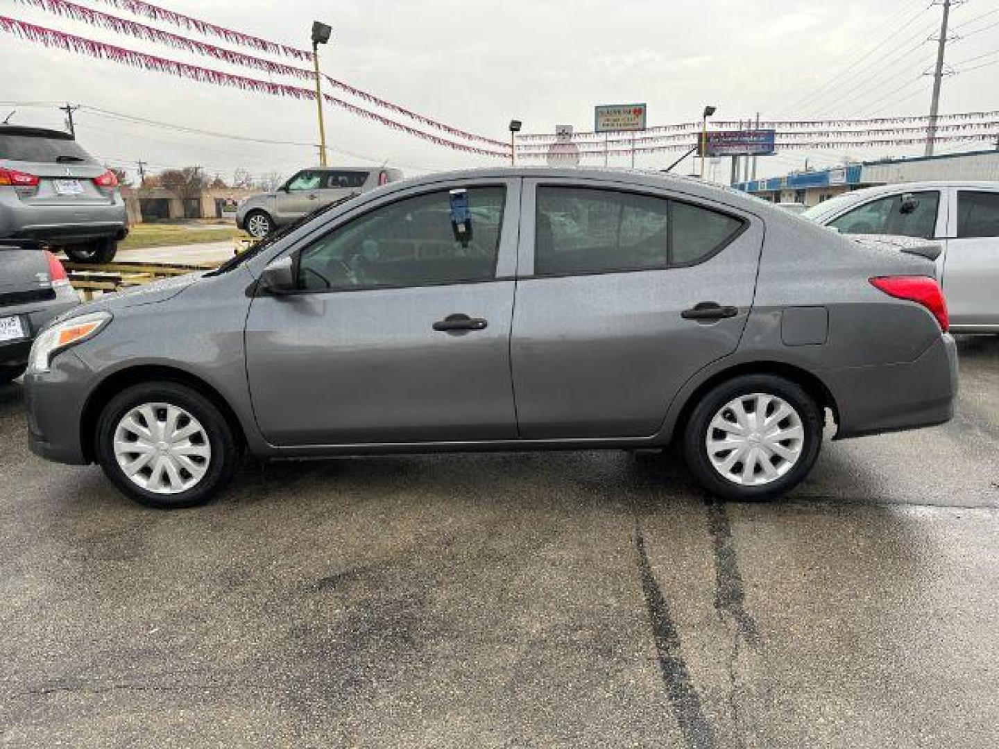 2019 GRAY Nissan Versa 1.6 S Plus (3N1CN7AP3KL) with an 1.6L L4 DOHC 16V engine, Continuously Variabl transmission, located at 2715 W Pioneer Pkwy, Arlington, TX, 76013, (817) 265-9009, 32.710262, -97.153236 - Photo#1