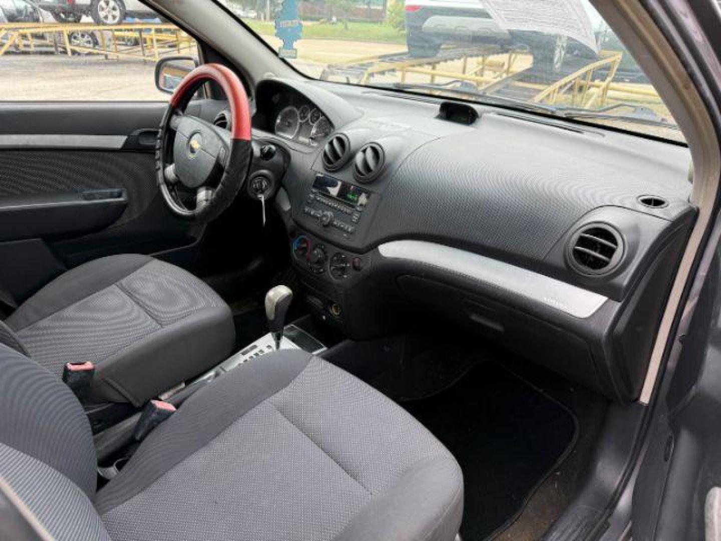2011 GREEN Chevrolet Aveo LT 4-Door (KL1TD5DE6BB) with an 1.6L L4 DOHC 16V engine, located at 2715 W Pioneer Pkwy, Arlington, TX, 76013, (817) 265-9009, 32.710262, -97.153236 - Photo#14