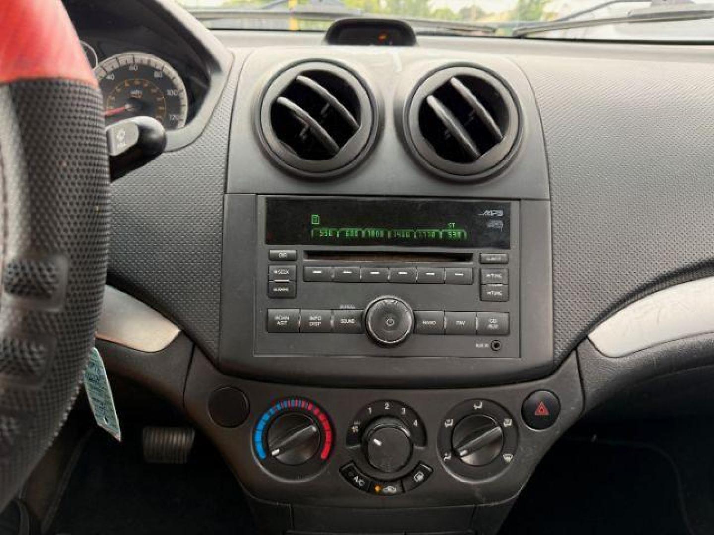 2011 GREEN Chevrolet Aveo LT 4-Door (KL1TD5DE6BB) with an 1.6L L4 DOHC 16V engine, located at 2715 W Pioneer Pkwy, Arlington, TX, 76013, (817) 265-9009, 32.710262, -97.153236 - Photo#17