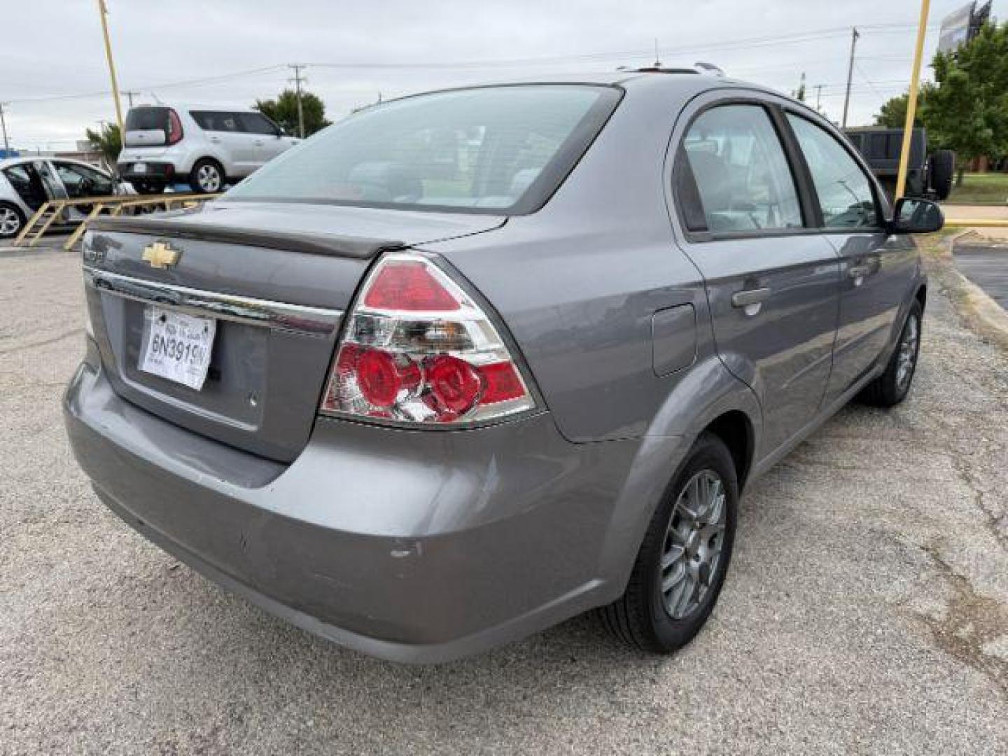 2011 GREEN Chevrolet Aveo LT 4-Door (KL1TD5DE6BB) with an 1.6L L4 DOHC 16V engine, located at 2715 W Pioneer Pkwy, Arlington, TX, 76013, (817) 265-9009, 32.710262, -97.153236 - Photo#6
