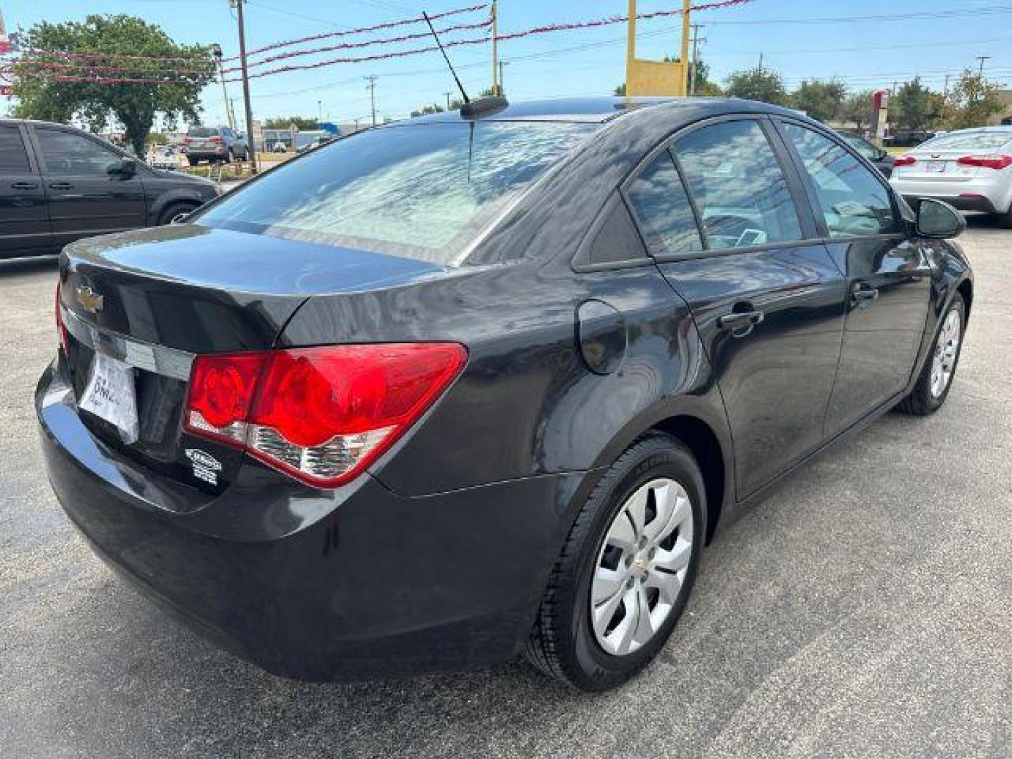 2015 BLACK Chevrolet Cruze LS Auto (1G1PA5SH7F7) with an 1.8L L4 DOHC 16V FFV engine, 6-Speed Automatic transmission, located at 2715 W Pioneer Pkwy, Arlington, TX, 76013, (817) 265-9009, 32.710262, -97.153236 - Photo#5