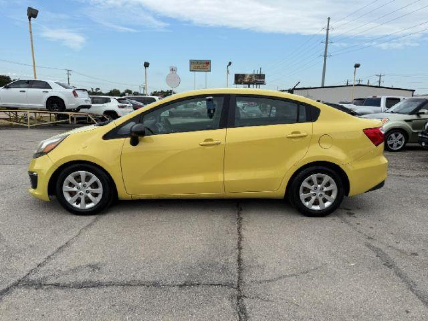 2016 YELLOW Kia Rio LX 6A (KNADM4A3XG6) with an 1.6L L4 DOHC 16V engine, 6-Speed Automatic transmission, located at 2715 W Pioneer Pkwy, Arlington, TX, 76013, (817) 265-9009, 32.710262, -97.153236 - Photo#2