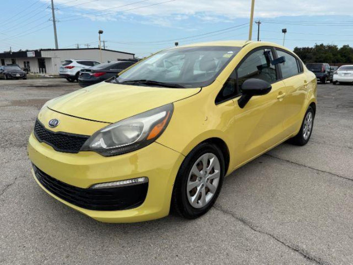 2016 YELLOW Kia Rio LX 6A (KNADM4A3XG6) with an 1.6L L4 DOHC 16V engine, 6-Speed Automatic transmission, located at 2715 W Pioneer Pkwy, Arlington, TX, 76013, (817) 265-9009, 32.710262, -97.153236 - Photo#3