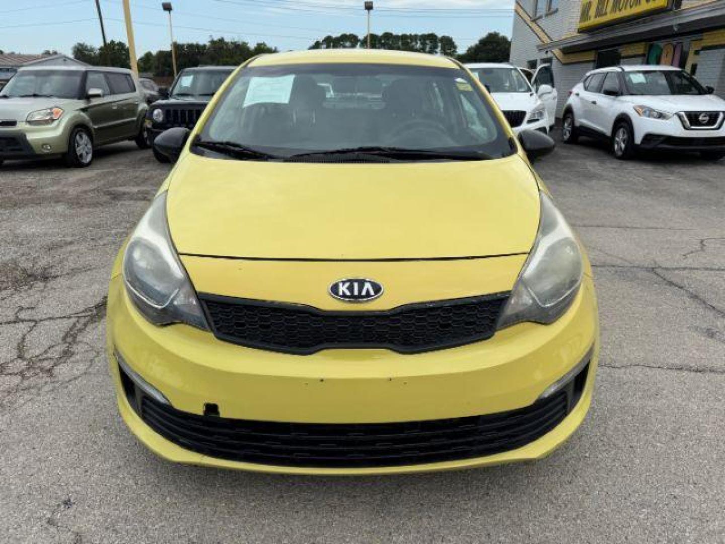 2016 YELLOW Kia Rio LX 6A (KNADM4A3XG6) with an 1.6L L4 DOHC 16V engine, 6-Speed Automatic transmission, located at 2715 W Pioneer Pkwy, Arlington, TX, 76013, (817) 265-9009, 32.710262, -97.153236 - Photo#4