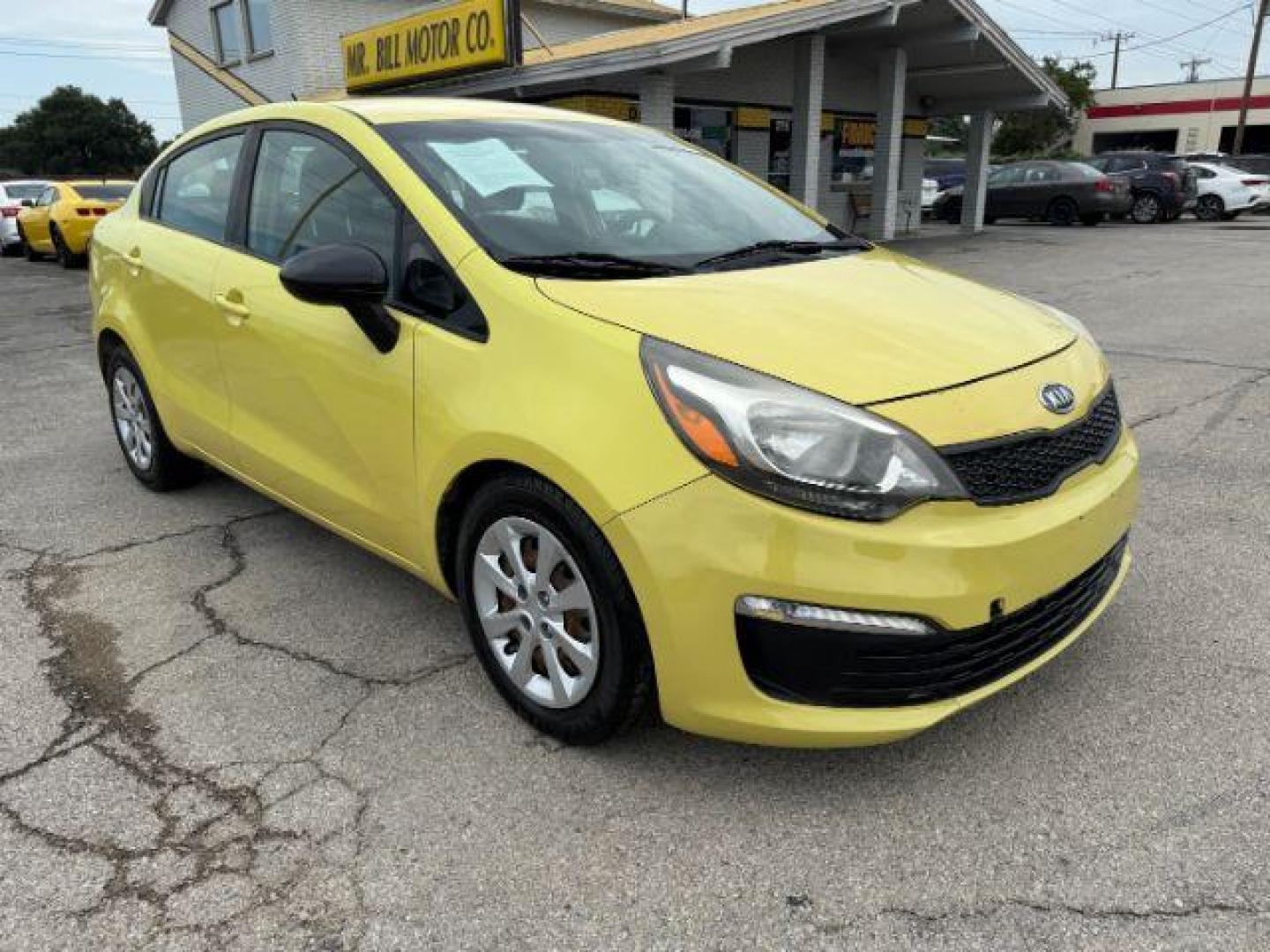 2016 YELLOW Kia Rio LX 6A (KNADM4A3XG6) with an 1.6L L4 DOHC 16V engine, 6-Speed Automatic transmission, located at 2715 W Pioneer Pkwy, Arlington, TX, 76013, (817) 265-9009, 32.710262, -97.153236 - Photo#5