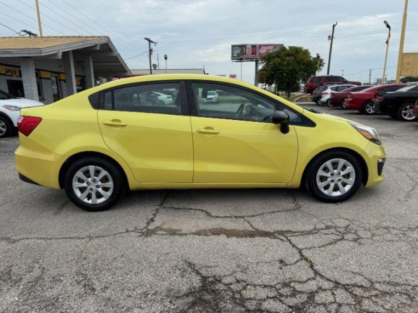 2016 YELLOW Kia Rio LX 6A (KNADM4A3XG6) with an 1.6L L4 DOHC 16V engine, 6-Speed Automatic transmission, located at 2715 W Pioneer Pkwy, Arlington, TX, 76013, (817) 265-9009, 32.710262, -97.153236 - Photo#6