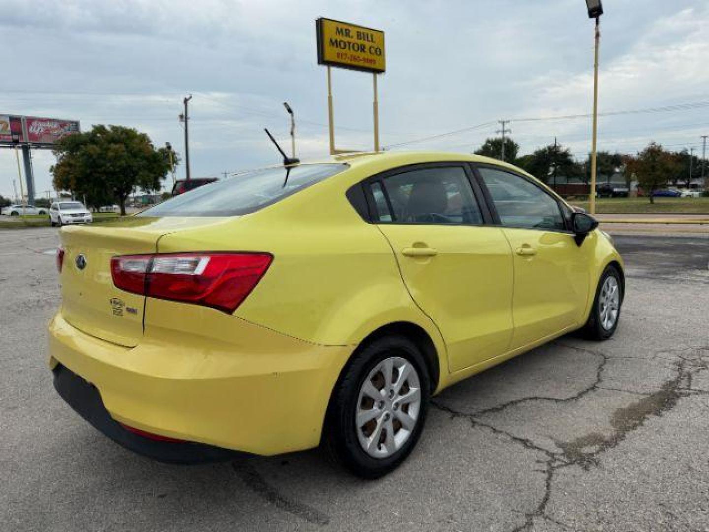 2016 YELLOW Kia Rio LX 6A (KNADM4A3XG6) with an 1.6L L4 DOHC 16V engine, 6-Speed Automatic transmission, located at 2715 W Pioneer Pkwy, Arlington, TX, 76013, (817) 265-9009, 32.710262, -97.153236 - Photo#7