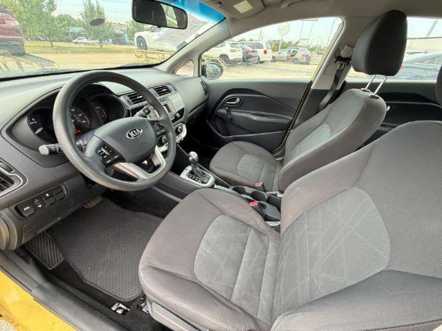 2016 YELLOW Kia Rio LX 6A (KNADM4A3XG6) with an 1.6L L4 DOHC 16V engine, 6-Speed Automatic transmission, located at 2715 W Pioneer Pkwy, Arlington, TX, 76013, (817) 265-9009, 32.710262, -97.153236 - Photo#14